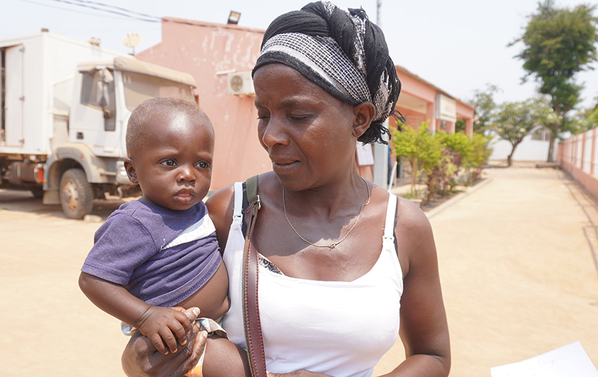 A mother holding her child in Angola