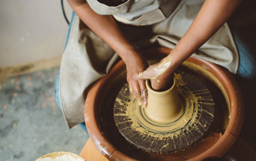 artisan working a potters wheel