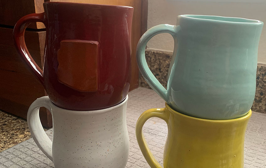 4 Haitian mugs