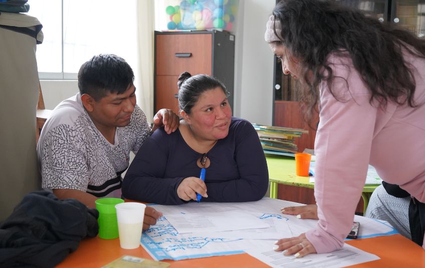 Yaritza and her husband working. 