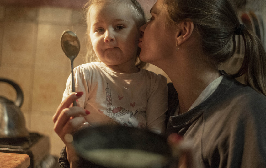 Mother and daughter cooking in Ukraine