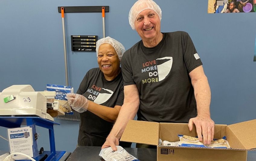 Man and woman volunteering at FMSC.