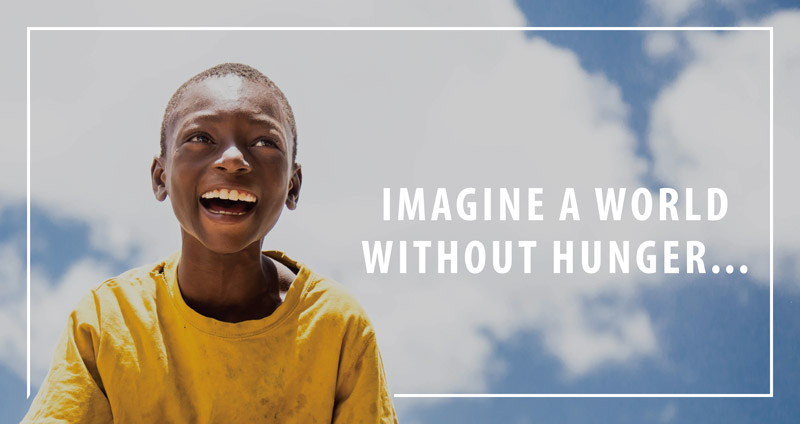 Smiling child with sky in the background and the words