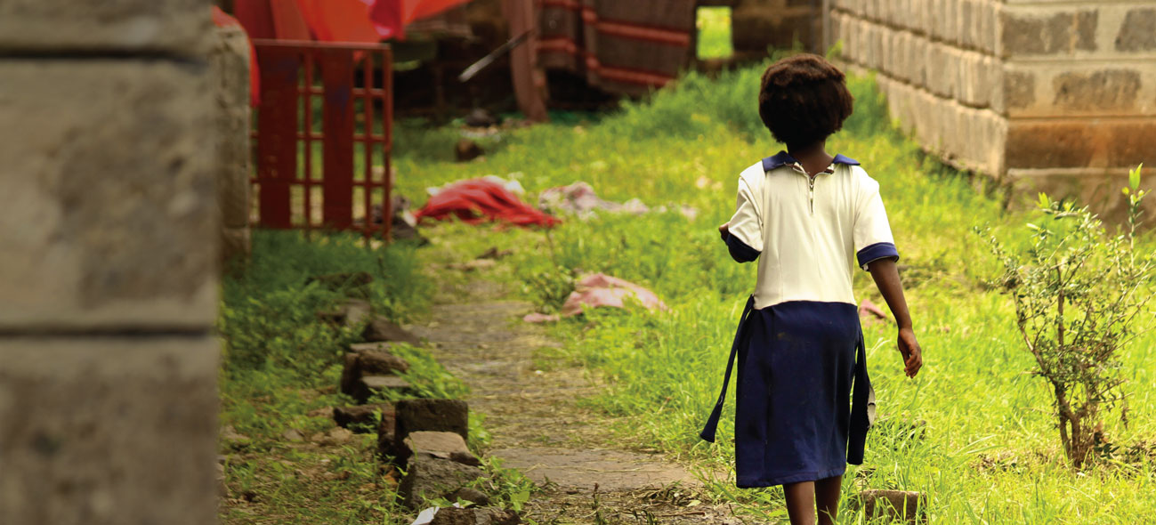 Girl walking down a path