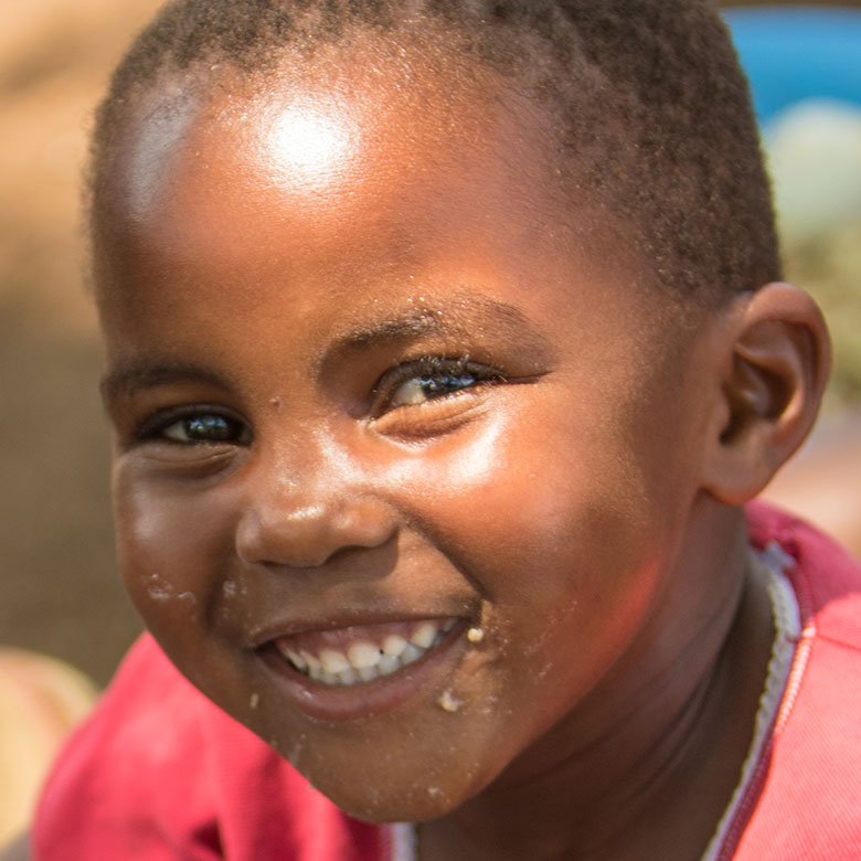 Child eating MannaPack Rice