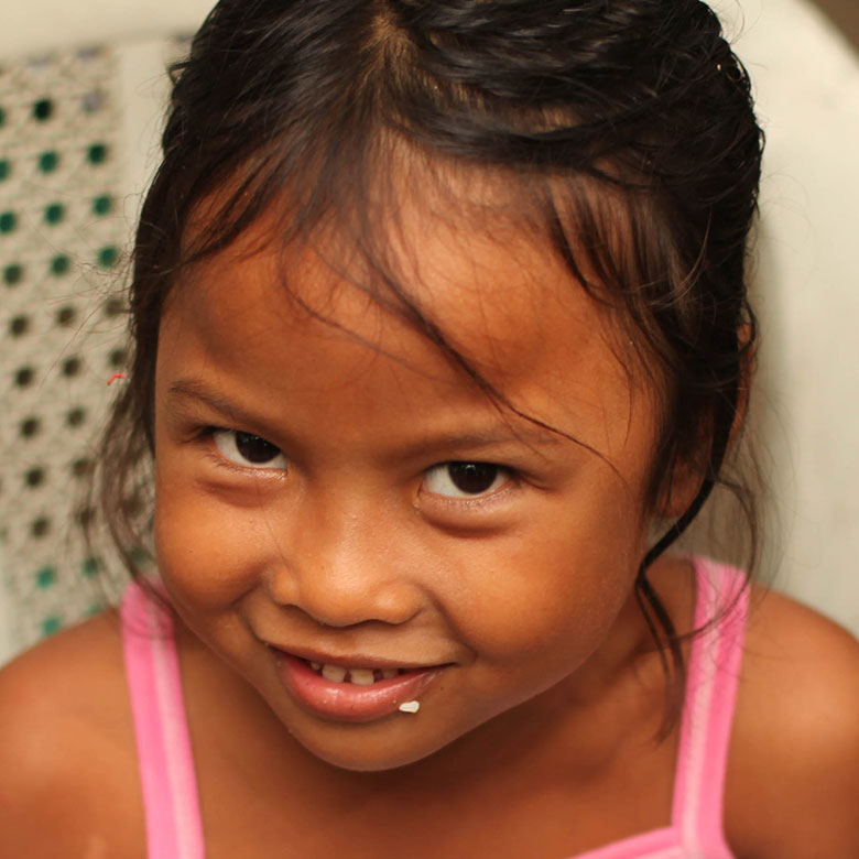Child eating MannaPack Rice